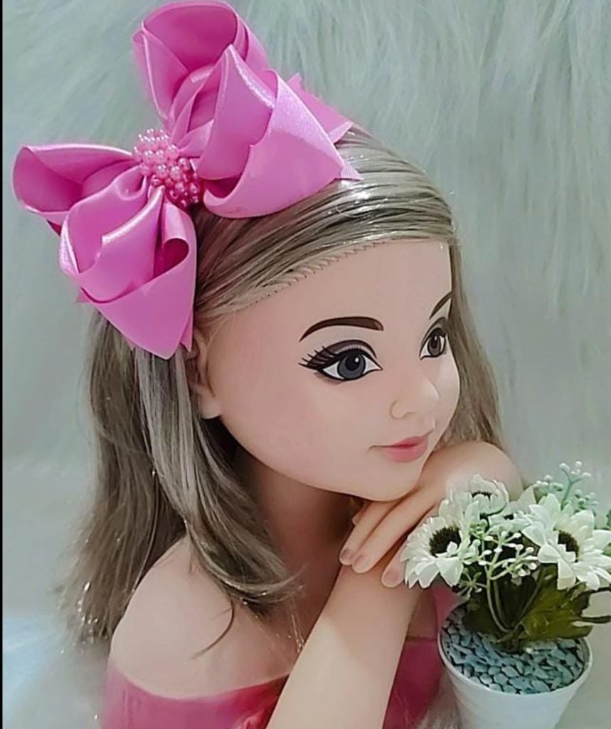 Tiara Belli Rosa Chiclete Laço Miolo de Perolas